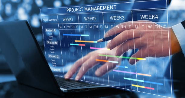 RSG project manager reviewing project plans in detail