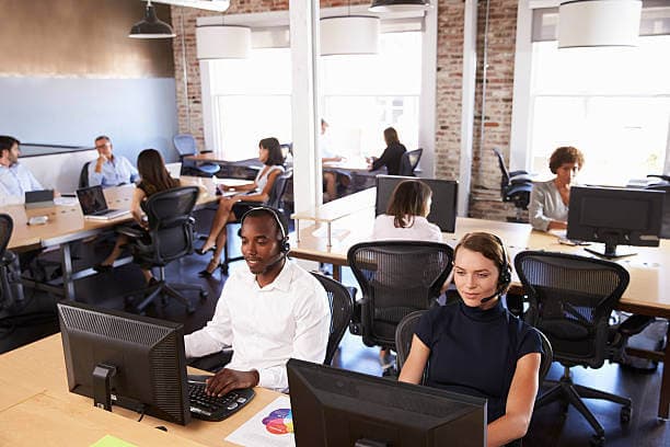 BPO team collaborating in an open office
