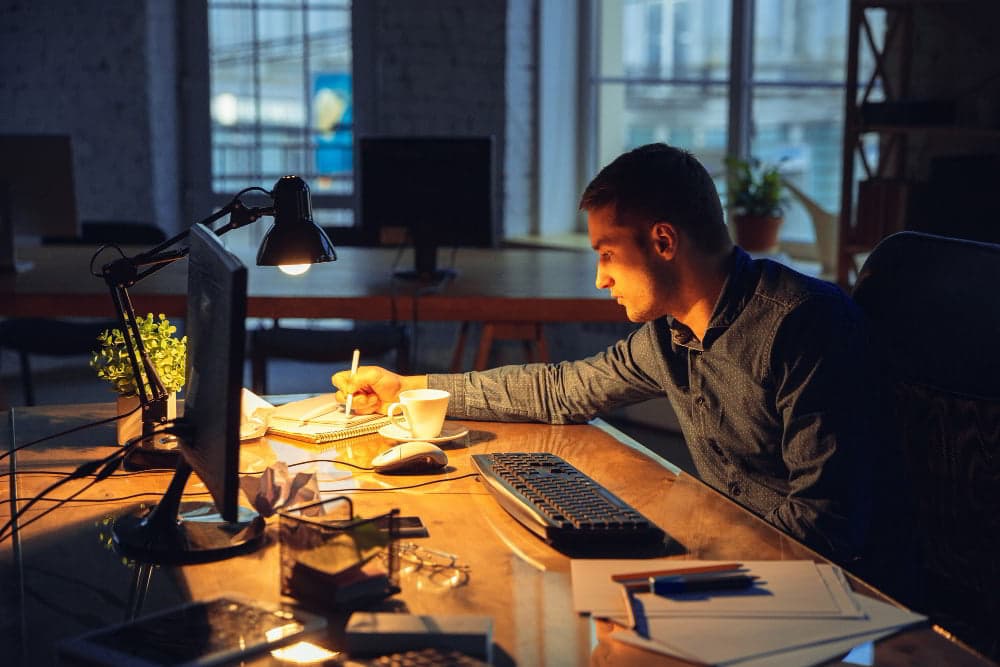 Employee working late at a desk